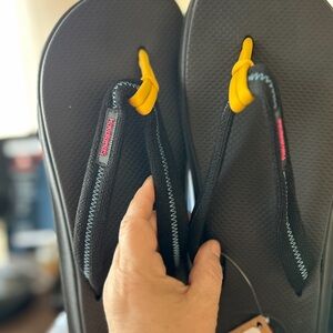 Havaianas Black and Yellow Flip Flops
